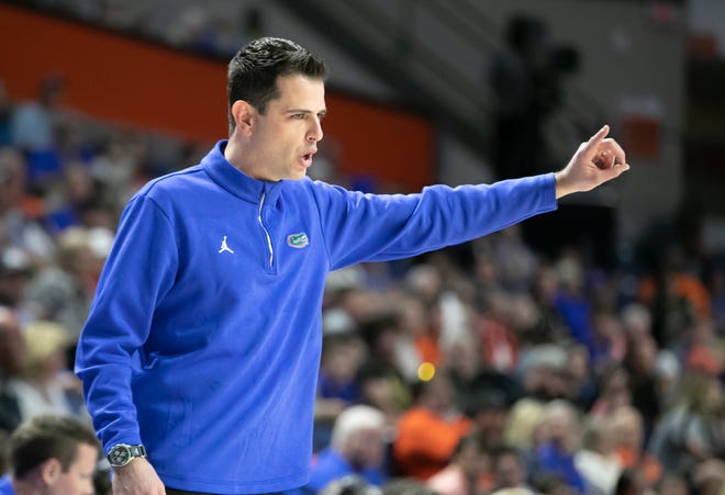 Florida Gators head coach Todd Golden coaches from the sideline during the first half of the NIT tournament Wednesday, March 15, 2023, at Exactech Arena in Gainesville, Fla. Alan Youngblood/Gainesville Sun 